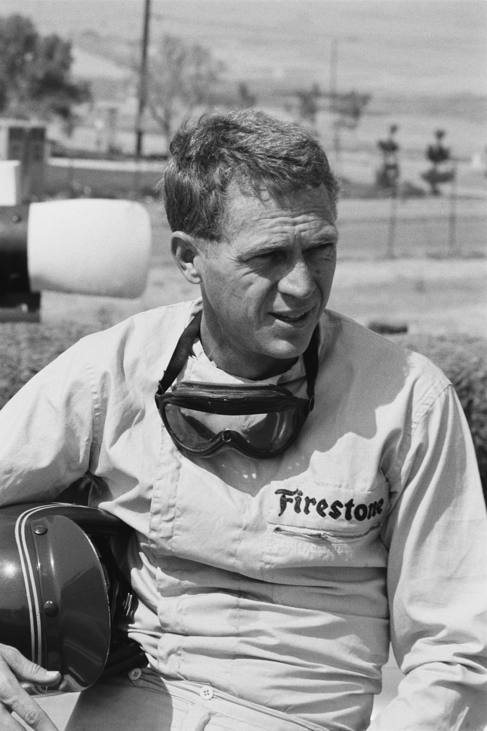 Steve McQueen in racing attire